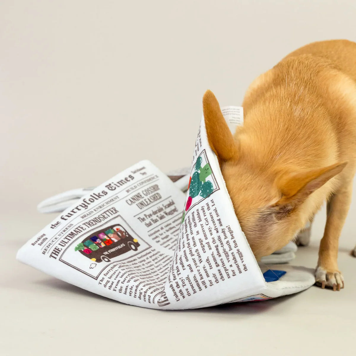 The FurryFolks Newspaper Squeaky Nosework Dog Toy