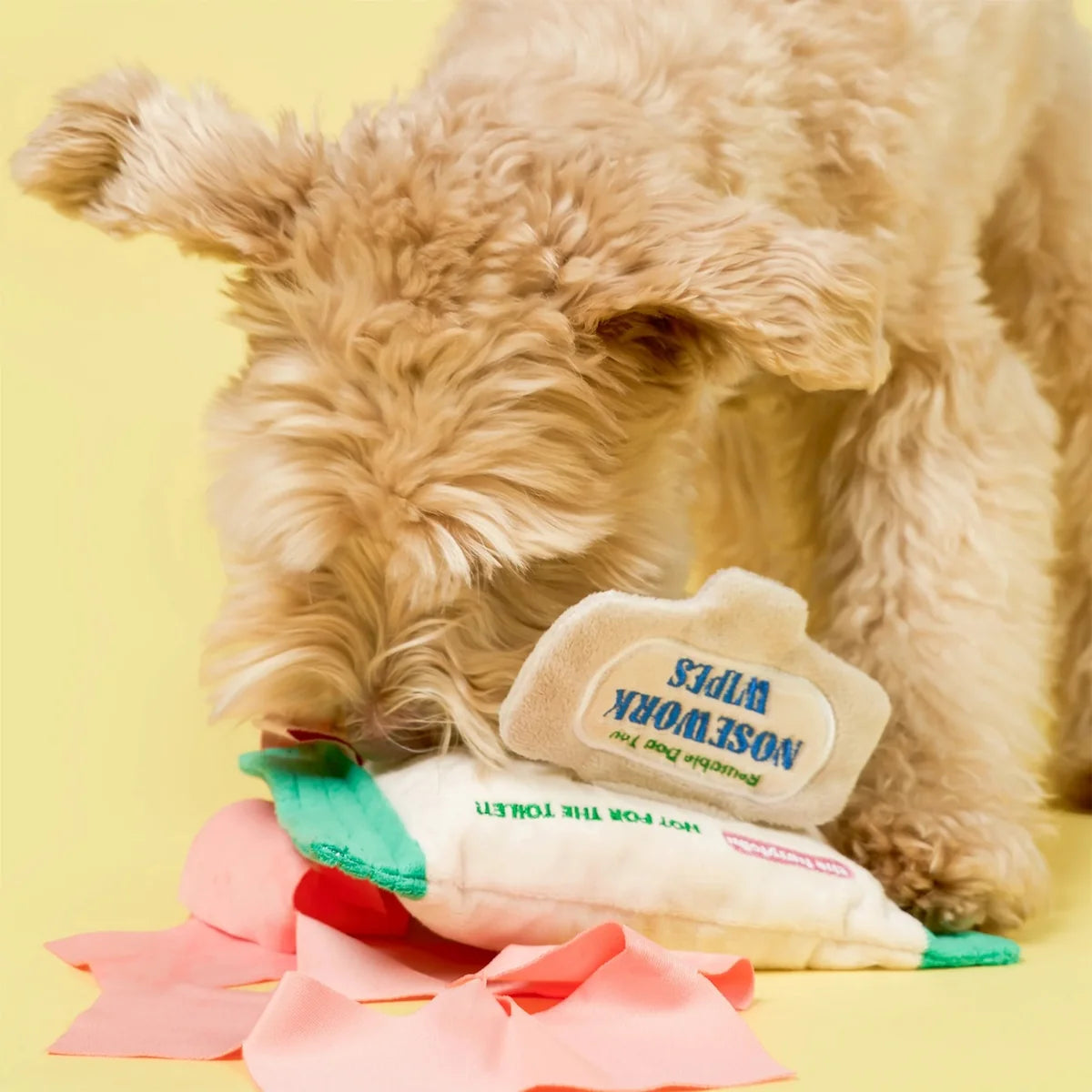 The FurryFolks Doggo Wipe Squeaky Nosework Toy